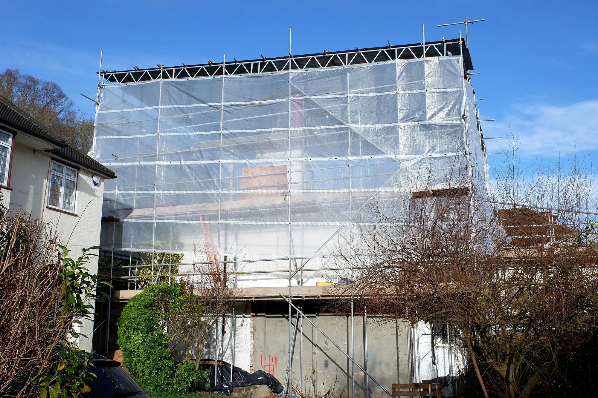 house under scaffolding